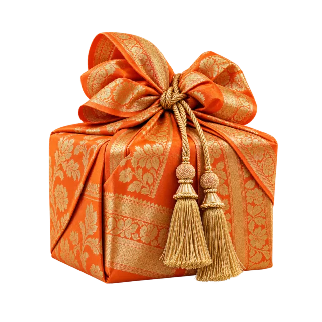 Orange patterned gift parcel with golden tassels