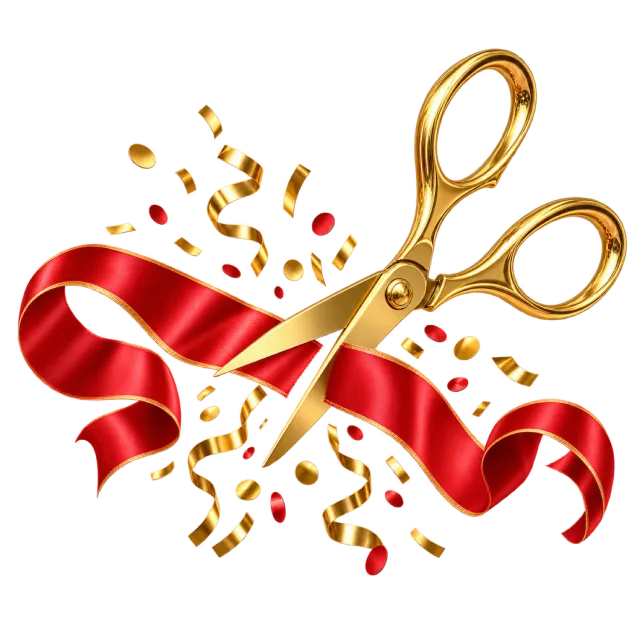 Golden scissors cutting a red ribbon amid confetti