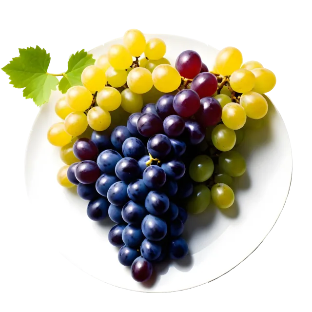 Round white plate of green and purple grapes topped with vine leaves on a transparent background
