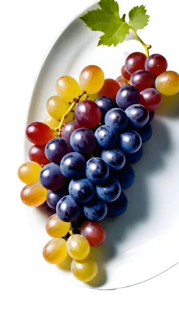 Vertical white platter with yellow-green and purple grapes and a leafy stem on a transparent background
