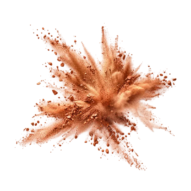 Copper-colored powder splash with scattered grains