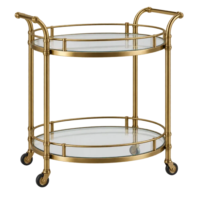 A gold-colored serving trolley with two oval glass shelves, handles and caster wheels
