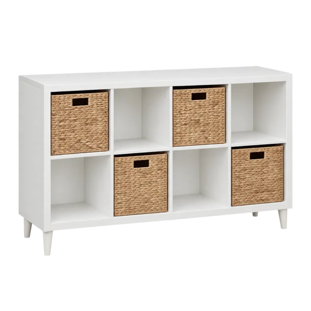 A white shelving unit with square compartments and four woven storage baskets