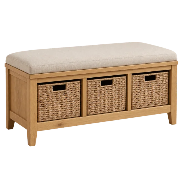 A wooden bench with a cream padded seat and three woven storage baskets
