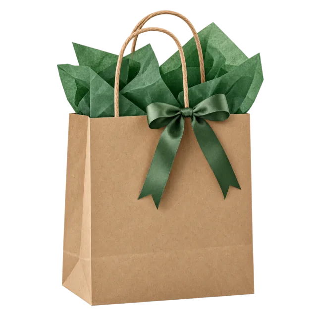 A brown paper gift bag with green tissue paper and a dark green bow