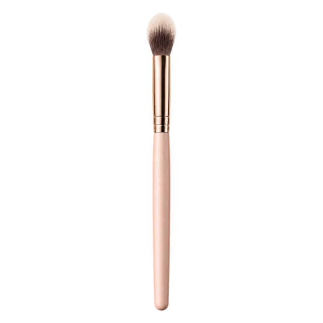 Realistic-style illustration of tapered eyeshadow blending brush