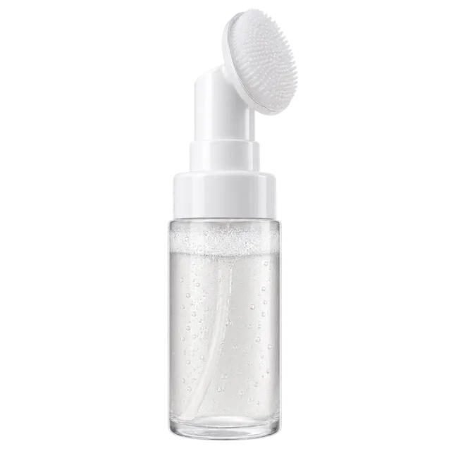 Realistic-style illustration of foaming cleanser bottle with silicone brush cap