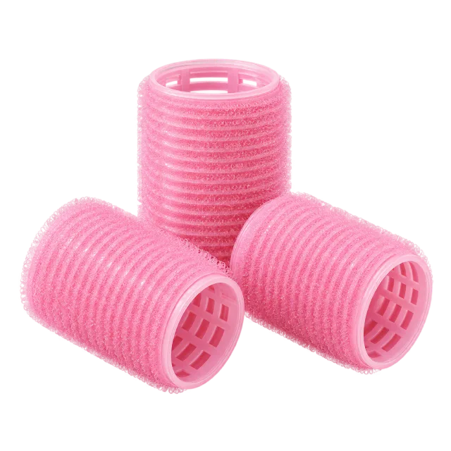 Realistic-style illustration of three pink mesh hair rollers