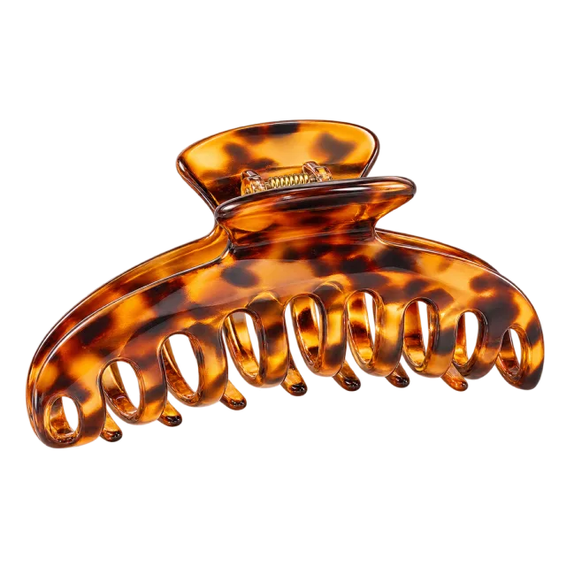 Realistic-style illustration of amber tortoiseshell hair claw clip